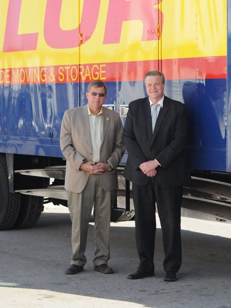 Two men with a truck