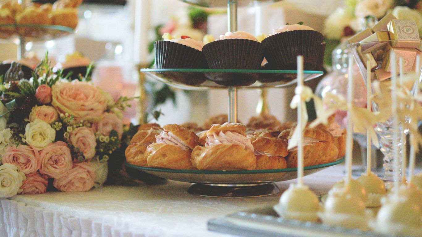 A tiered dessert display for a wedding