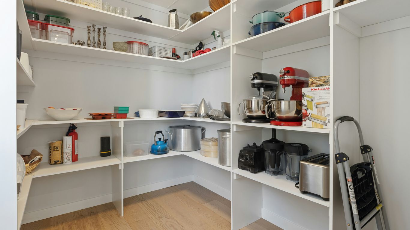 Pantry shelves with organized food containers