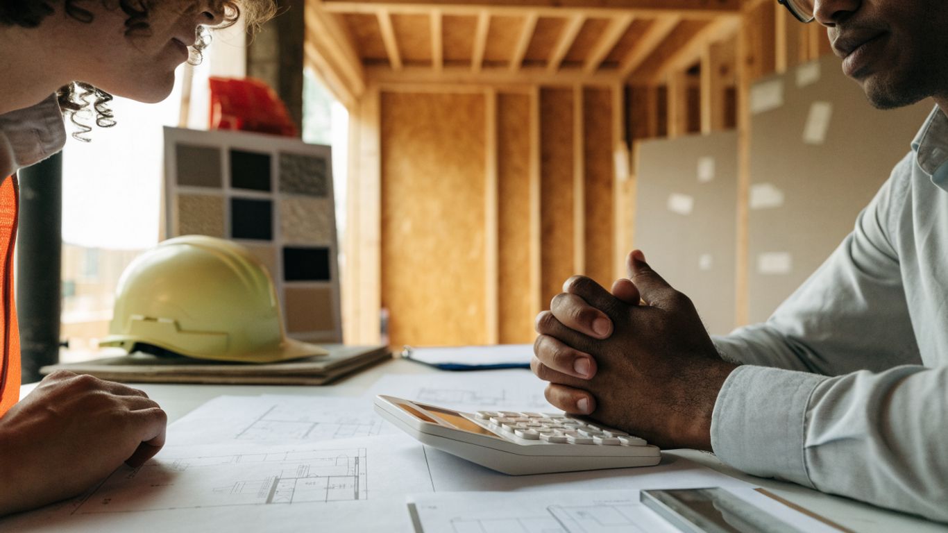 Construction budget and plans on a residential site