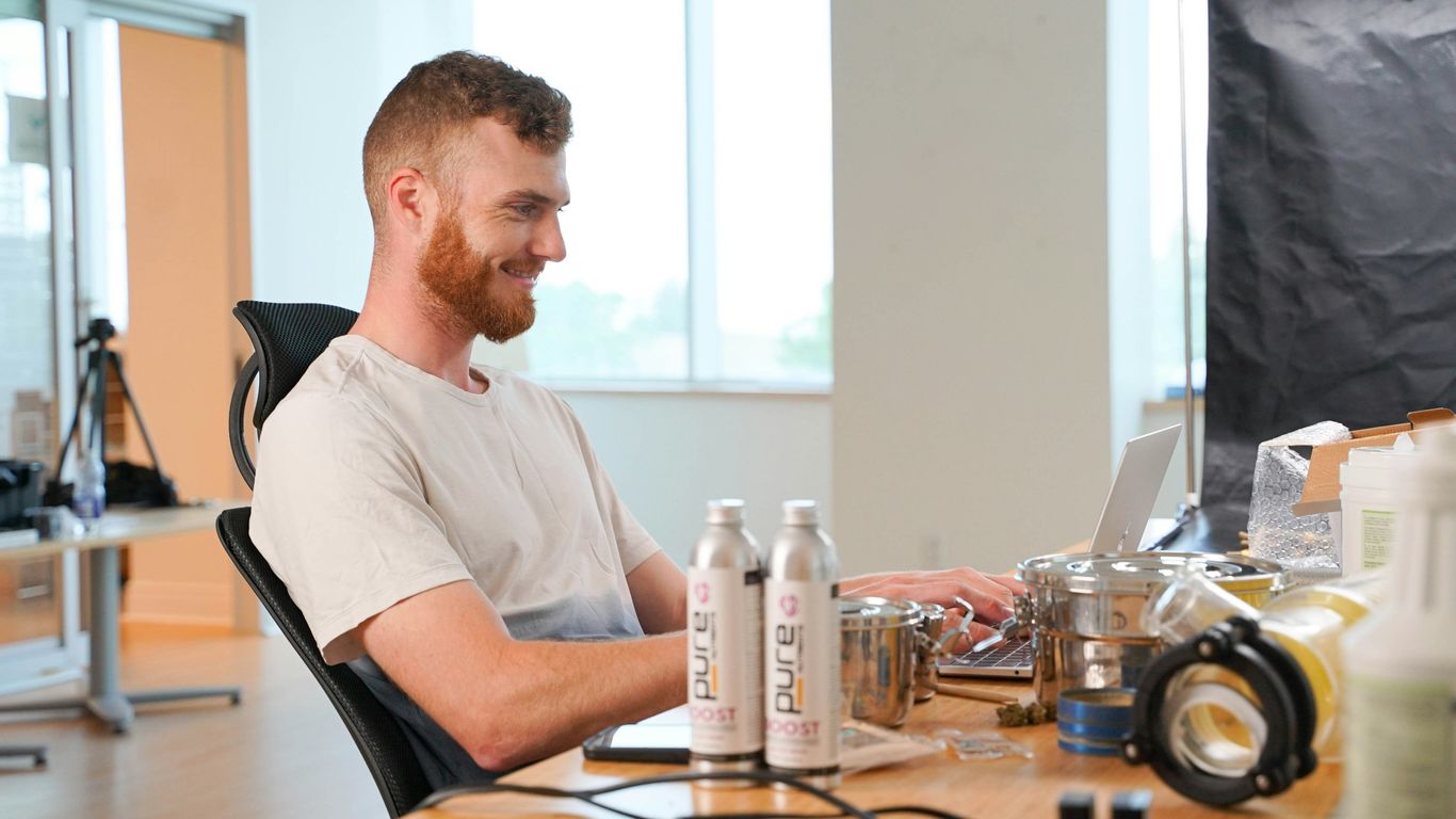 a man sitting at a desk