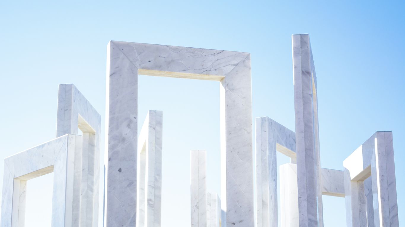Fabricator reviewing a marble slab layout