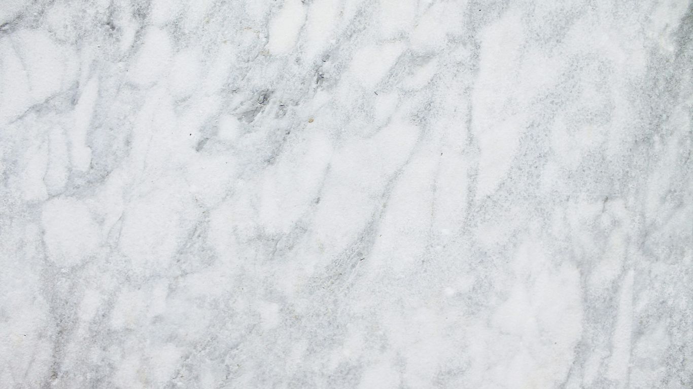 Close view of a veined marble tabletop