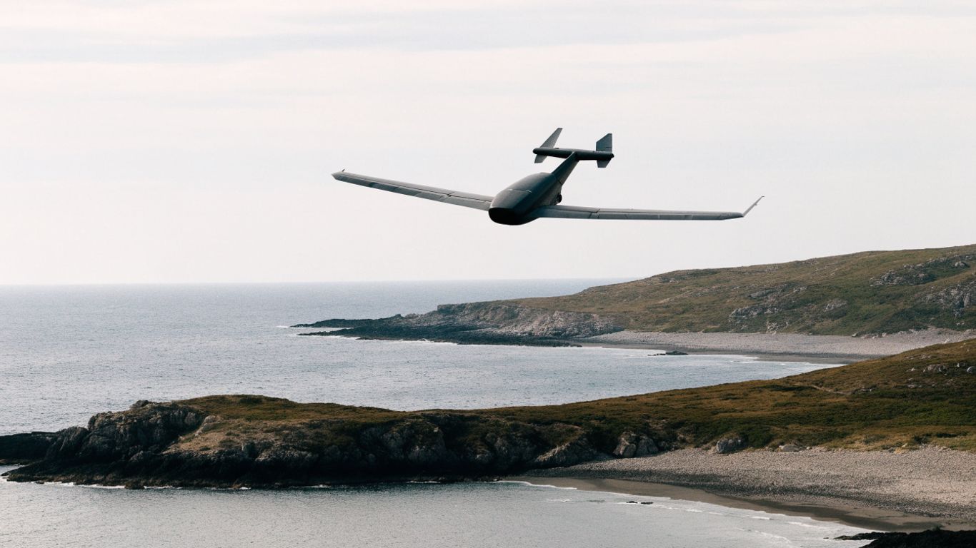 RQ-21 aircraft observing terrain from above