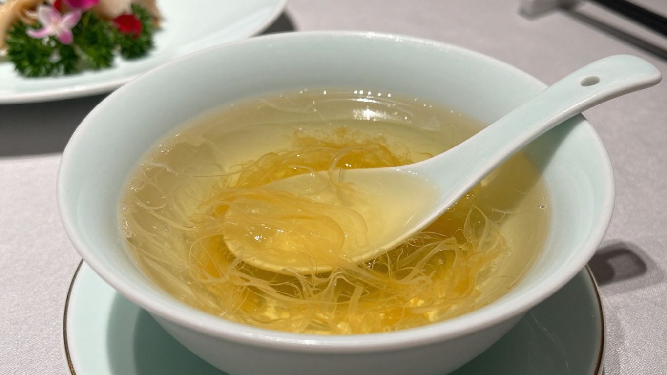 Delicate bird’s nest soup in a porcelain bowl