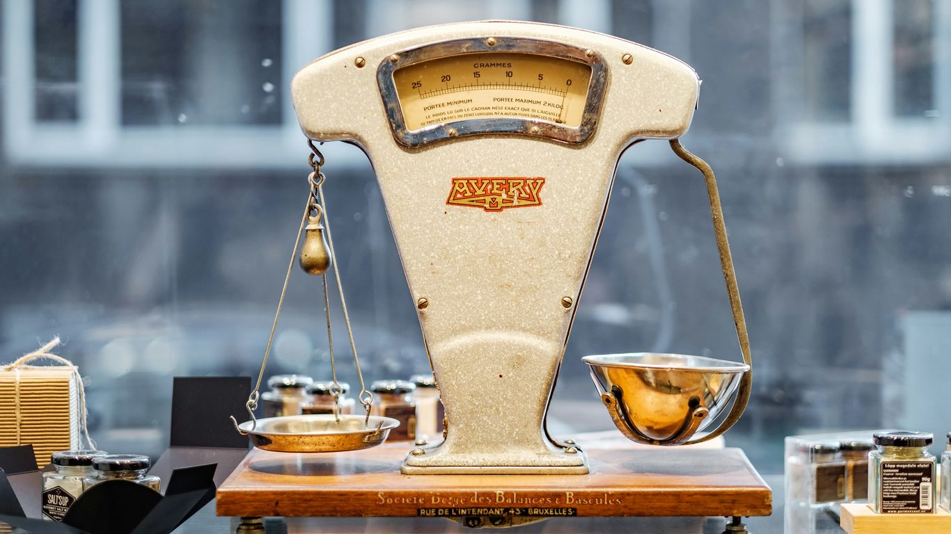 brown and beige weighing scale