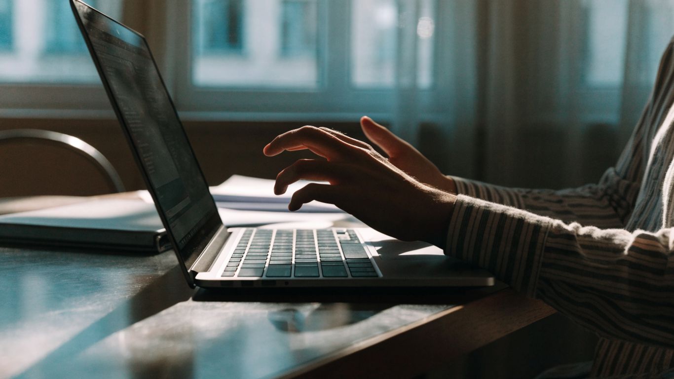 A person testing a local converter on a laptop