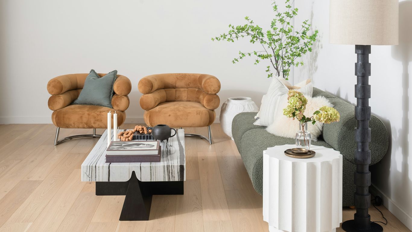 Textured dining chairs around marble table