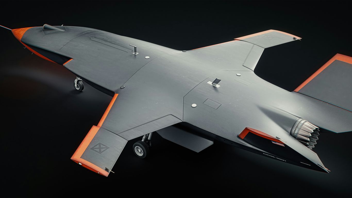 A gray aircraft is viewed from above.