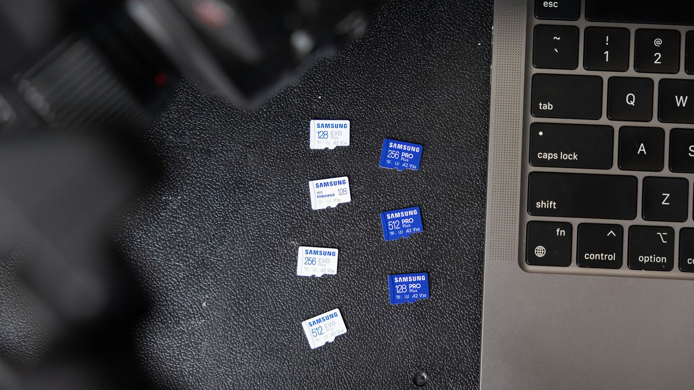 a black keyboard and a black laptop