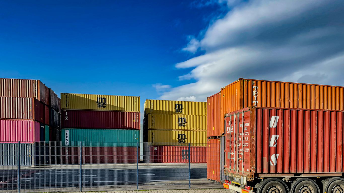 Container truck transporting steel cargo