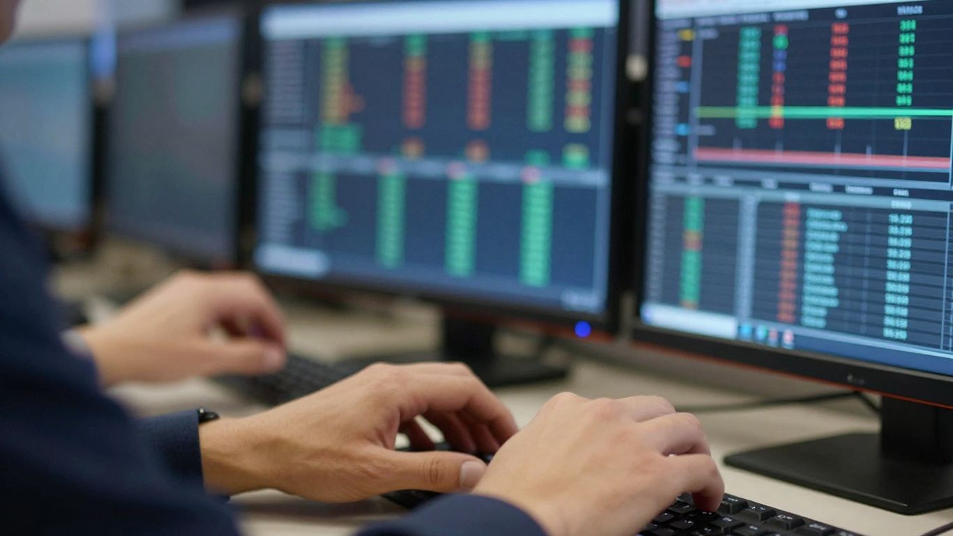 Hands actively trading on a computer screen.