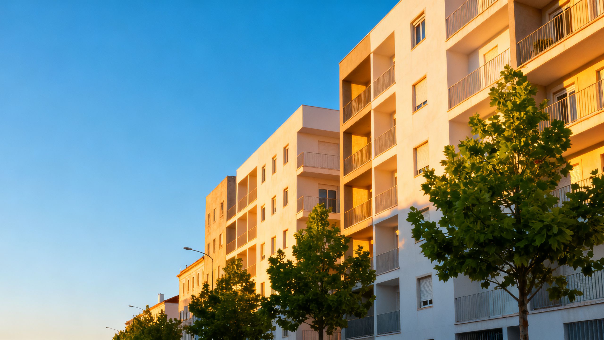Modern Portuguese apartment building symbolizing housing market changes.