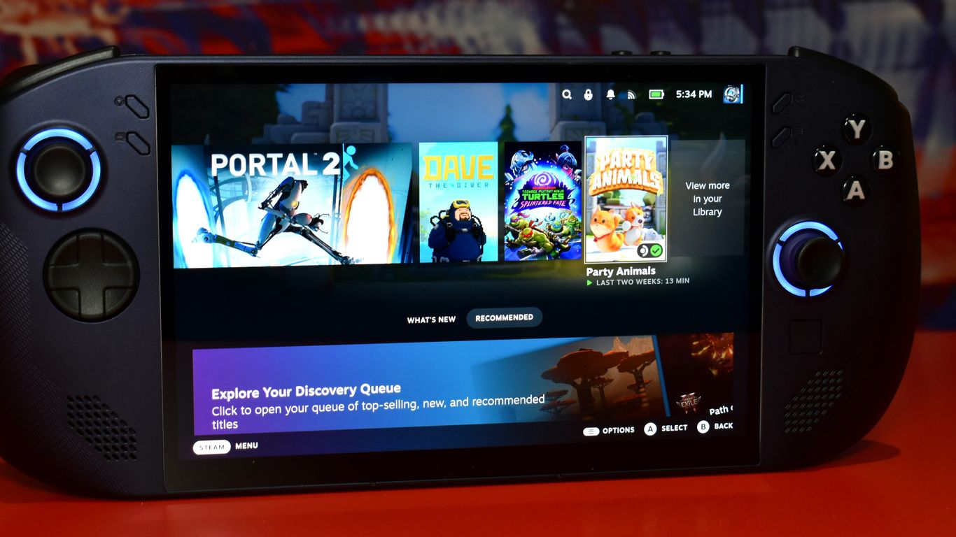 Handheld gaming device displaying game library