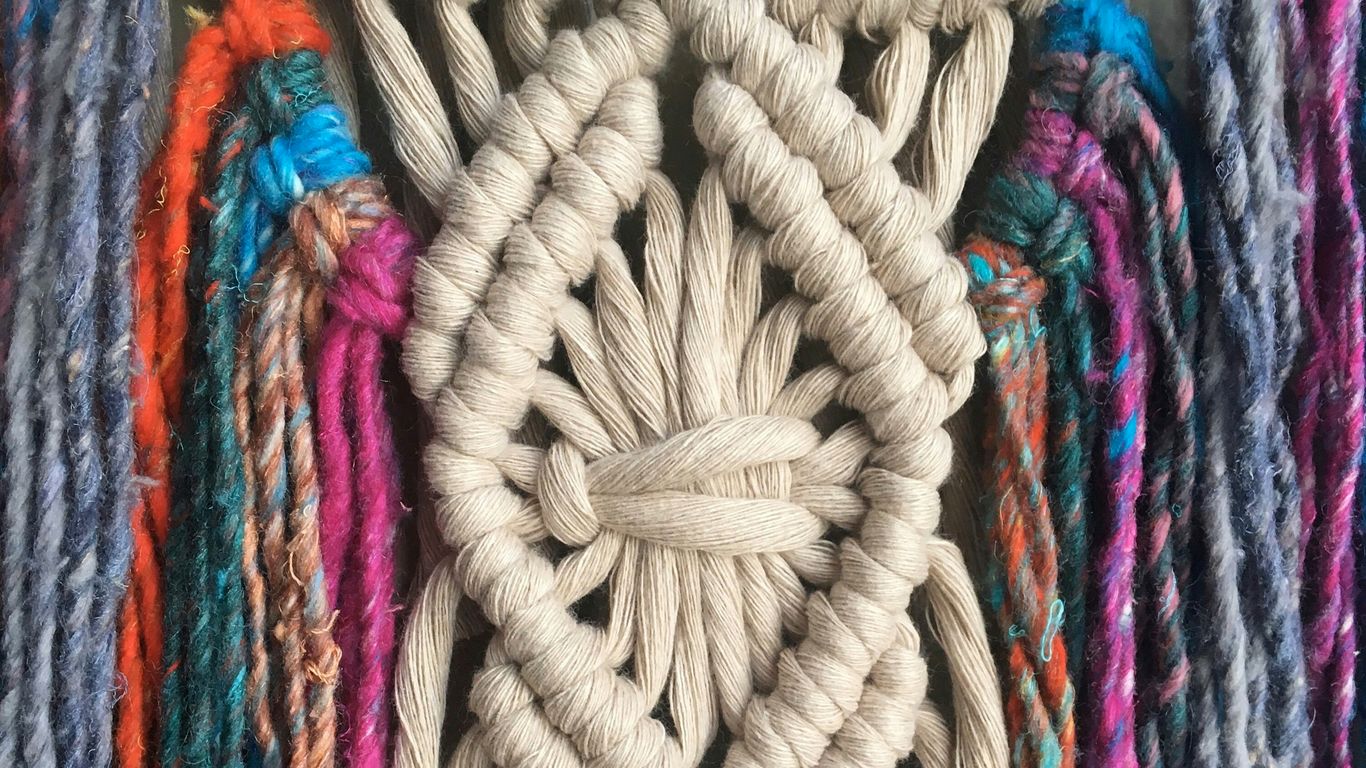 white and multicolored textiles