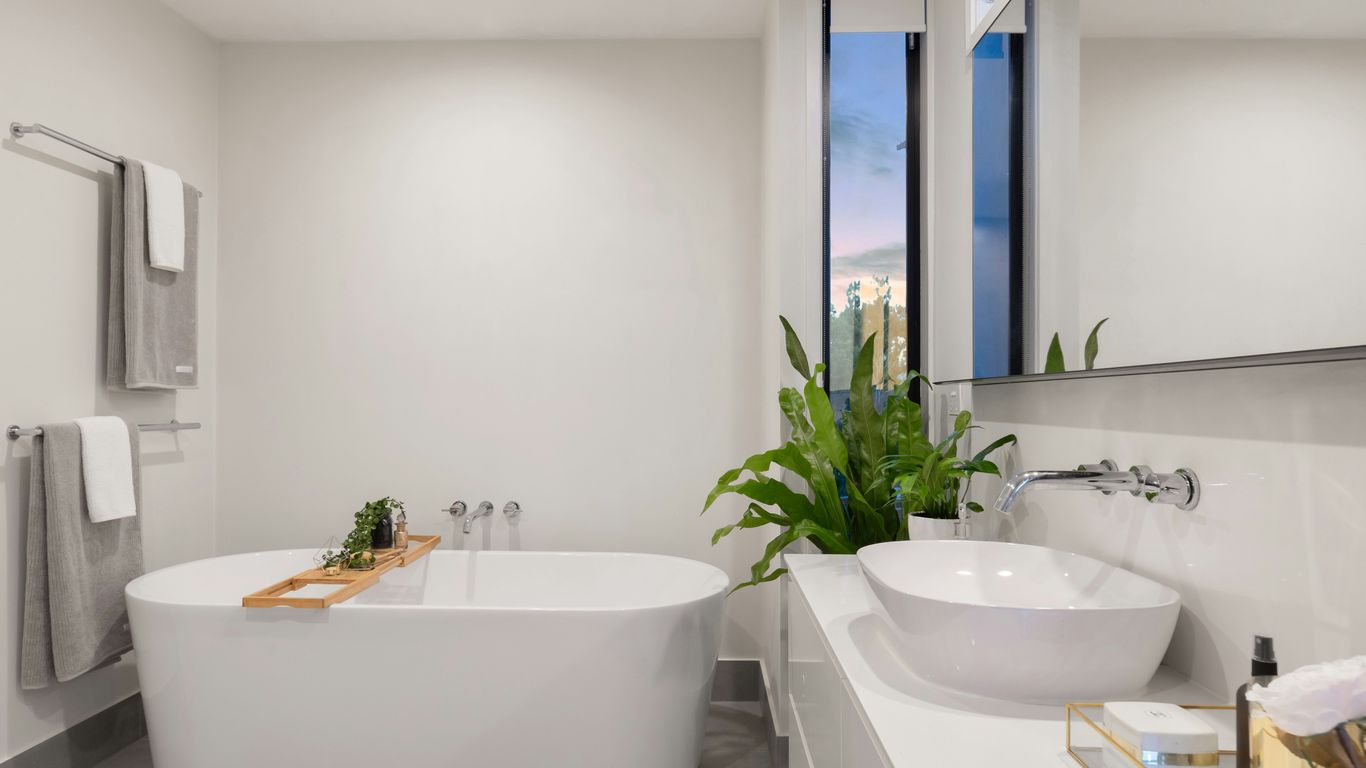 Upper-floor bathroom with stone bathtub