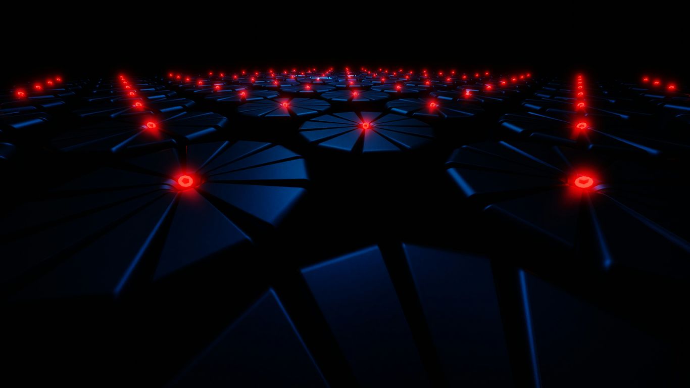 a dark room filled with red and blue lights