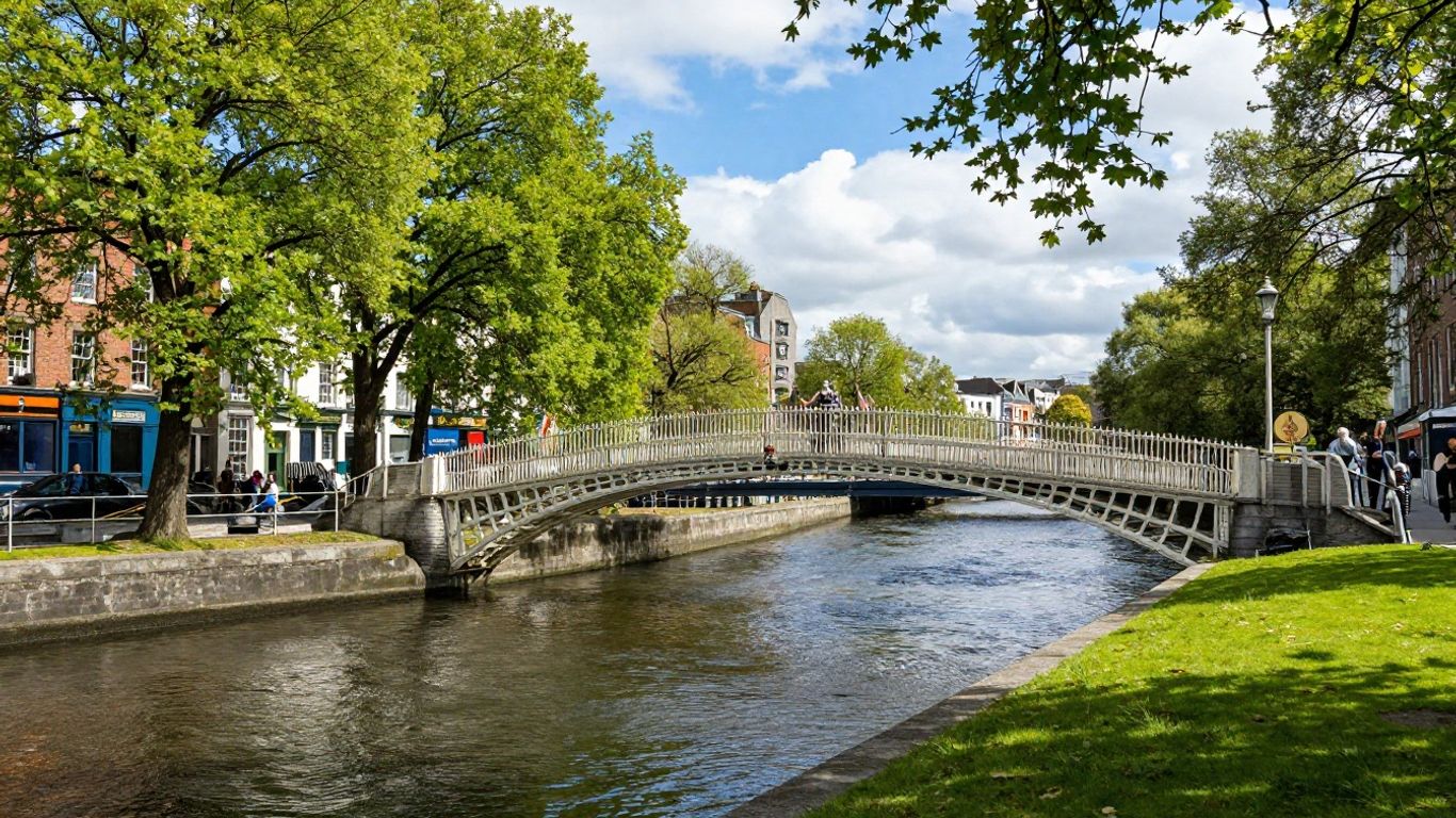Ha'penny Bridge in Dublin, Ireland, over River Liffey.