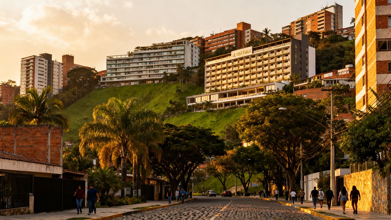 Tree-lined Medellín neighborhood with varied accommodation