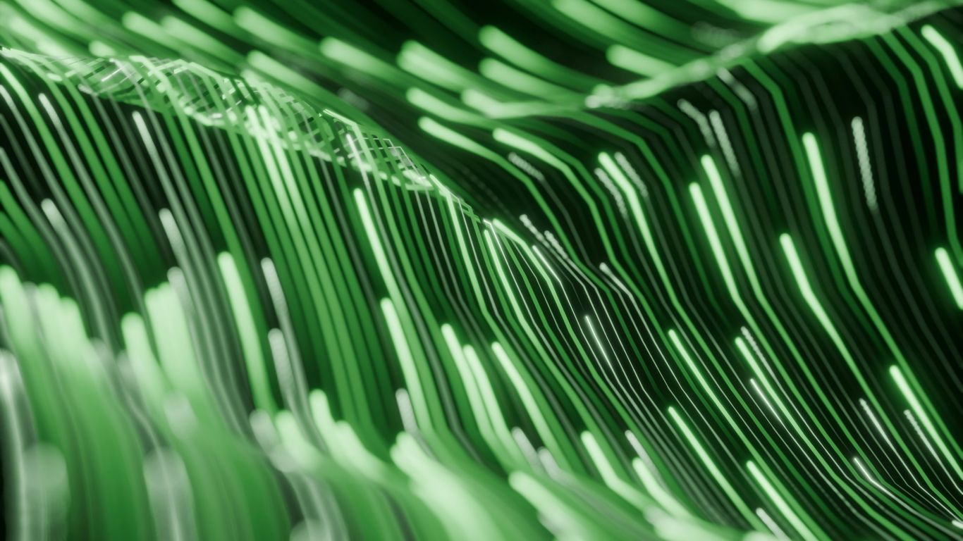 Abstract green streaks of light forming waves