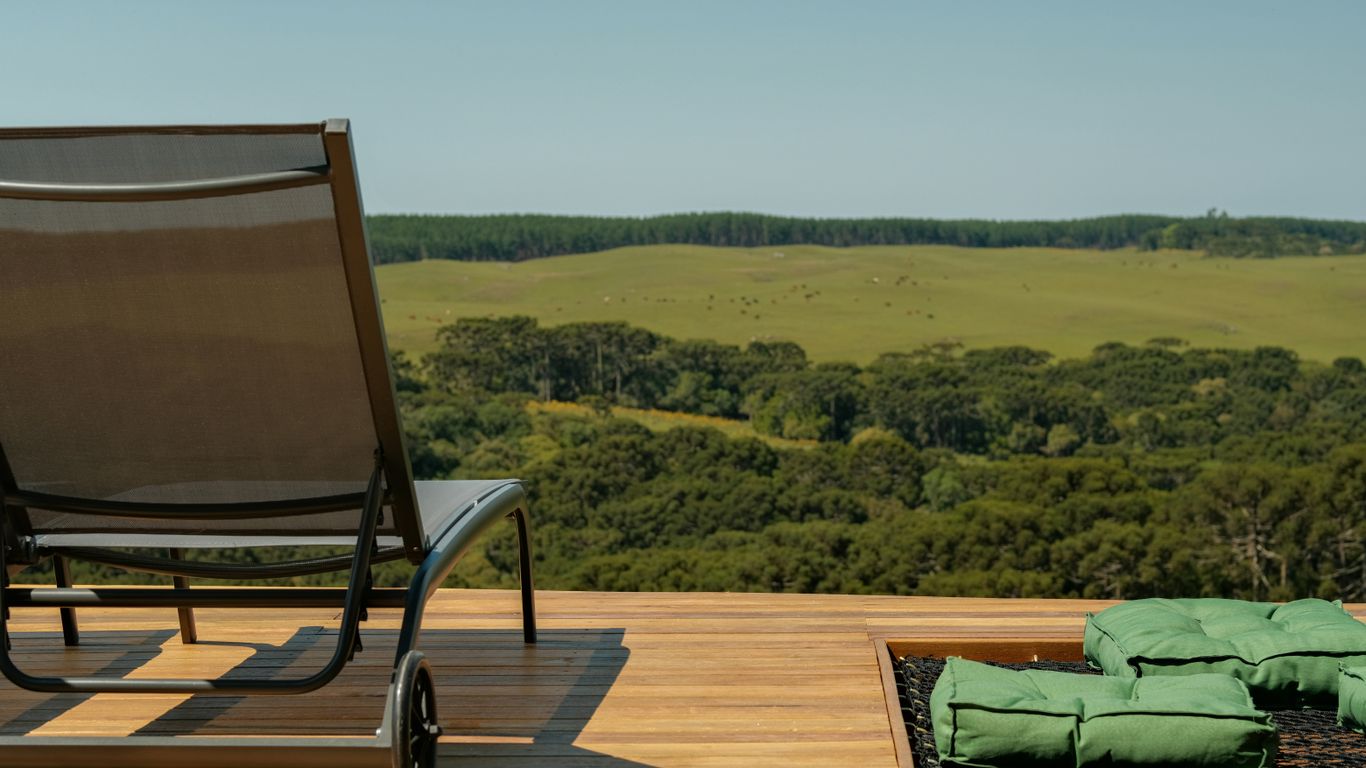 Yoga mat laid on wooden outdoor deck