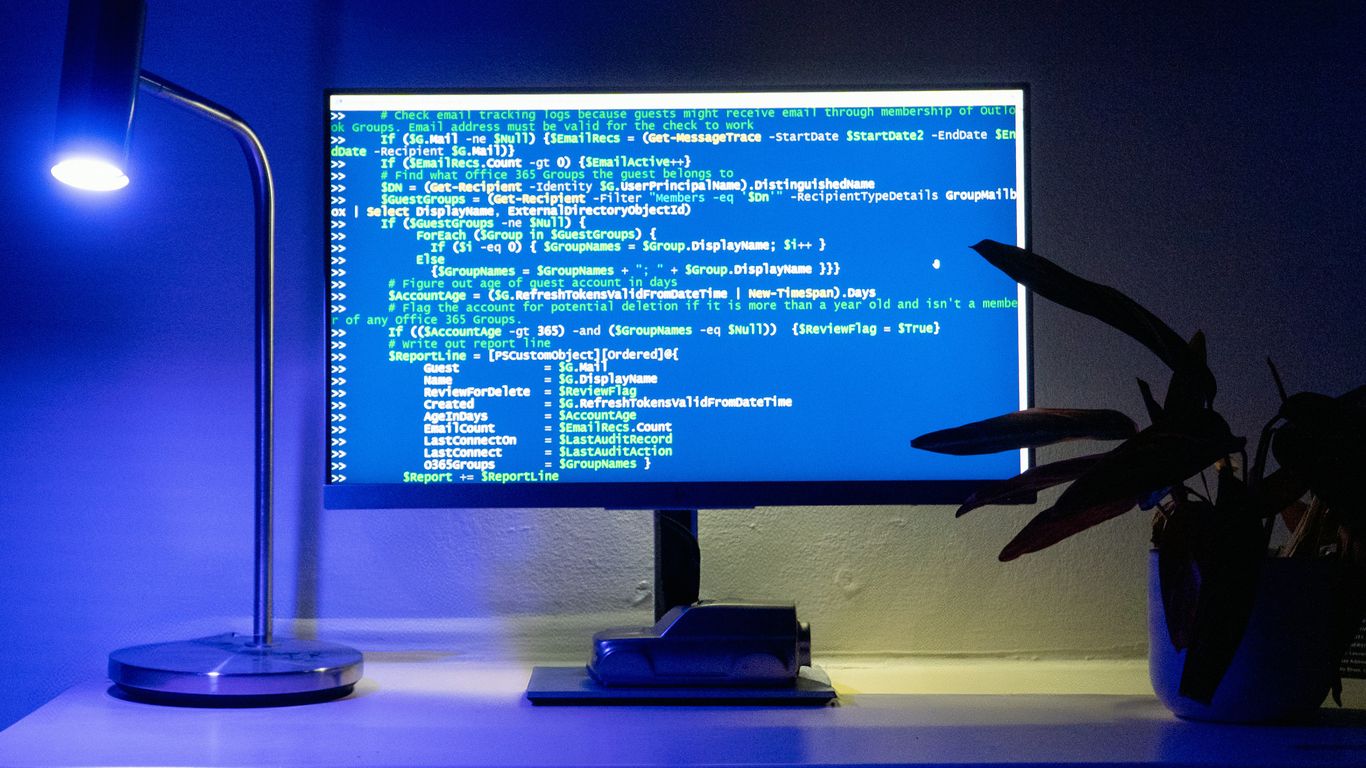 A computer screen displays lines of code.