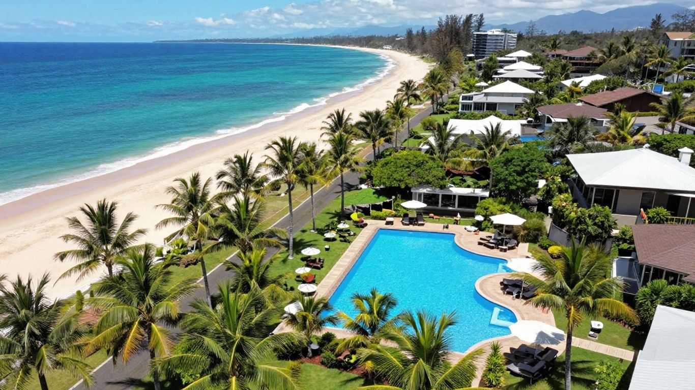 Oaks Hervey Bay resort with pool and ocean view.