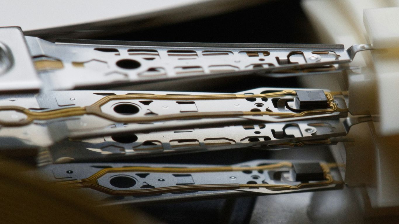 a couple of pieces of metal sitting on top of a table