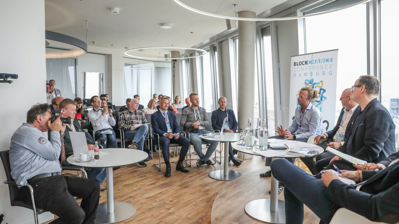 people sitting on chair in conference room
