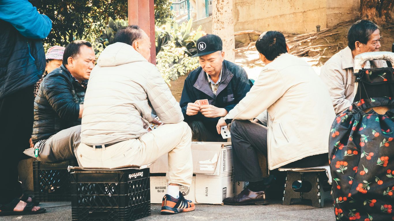 four man sitting on the chair