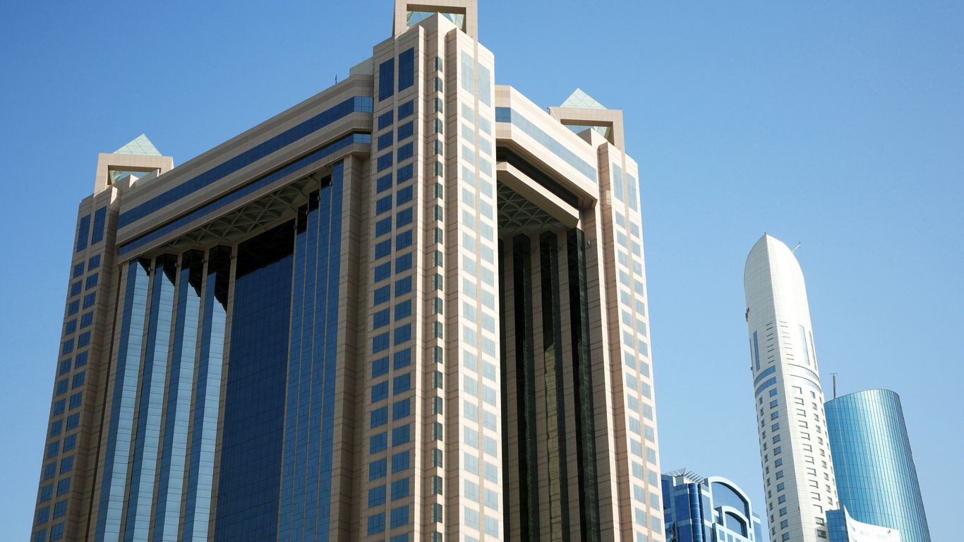 white concrete building under blue sky during daytime