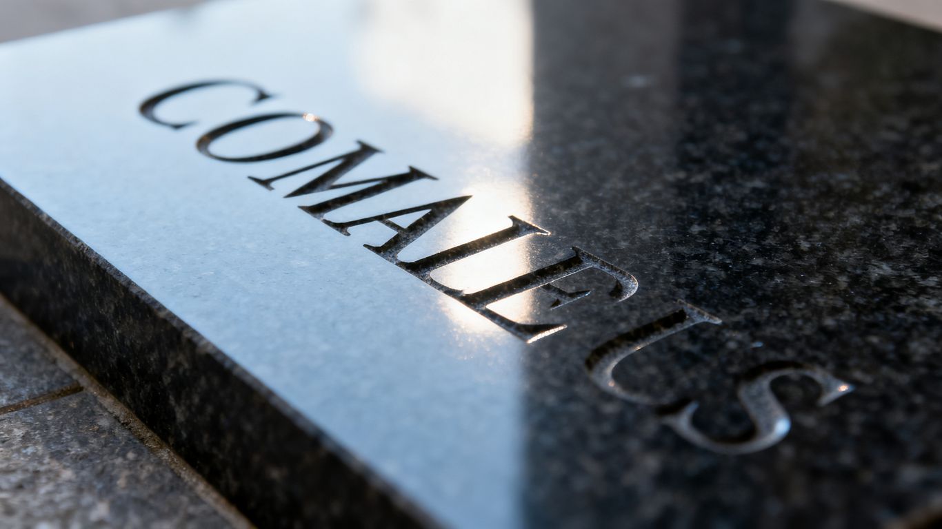 Close-up of detailed engraving on a granite surface