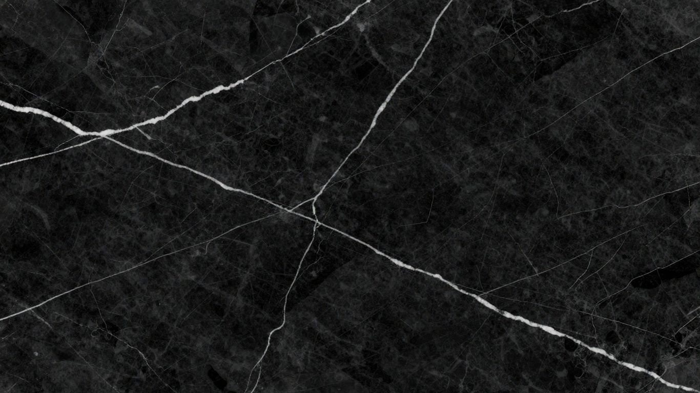Nero Marquina marble slabs with white veining.