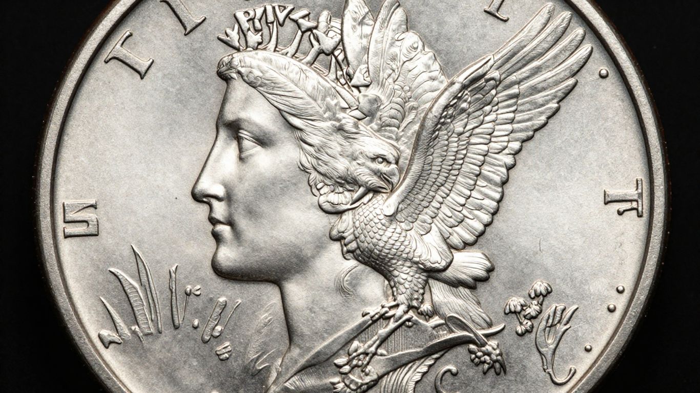Close-up of a silver Peace Dollar coin.