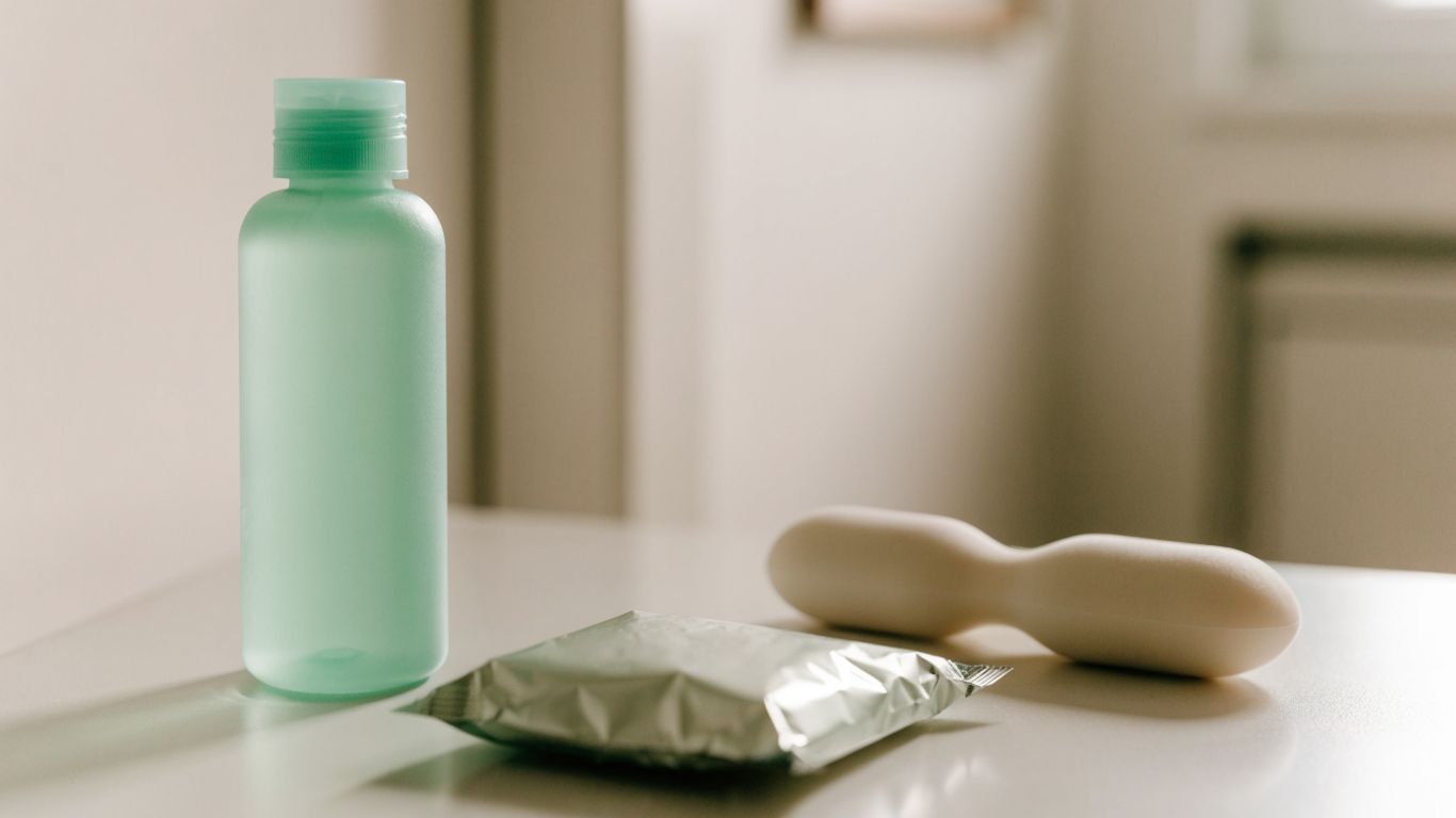 Personal lubricant and clean intimate accessories on a shelf