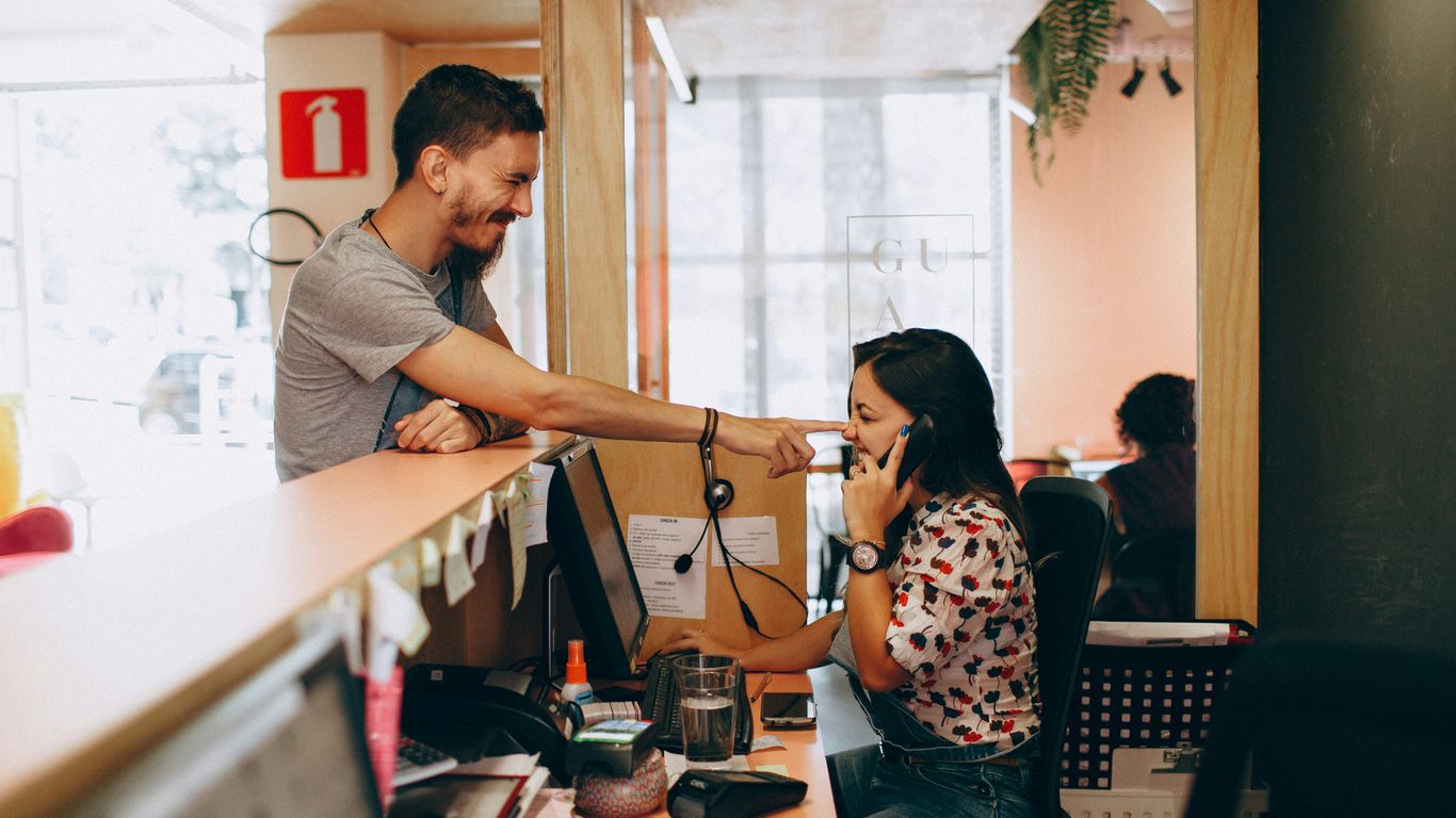 man and woman talking to each other