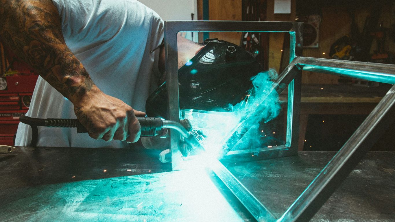 Fabricator working on acrylic