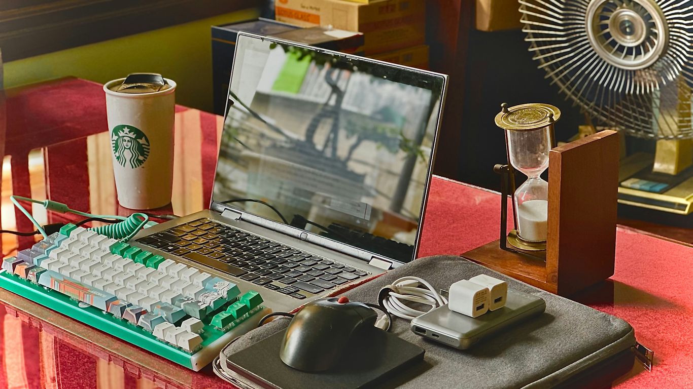 A laptop computer sitting on top of a desk