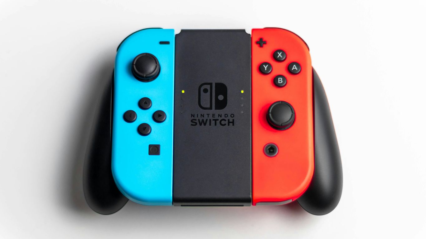 red and black nintendo switch game controller