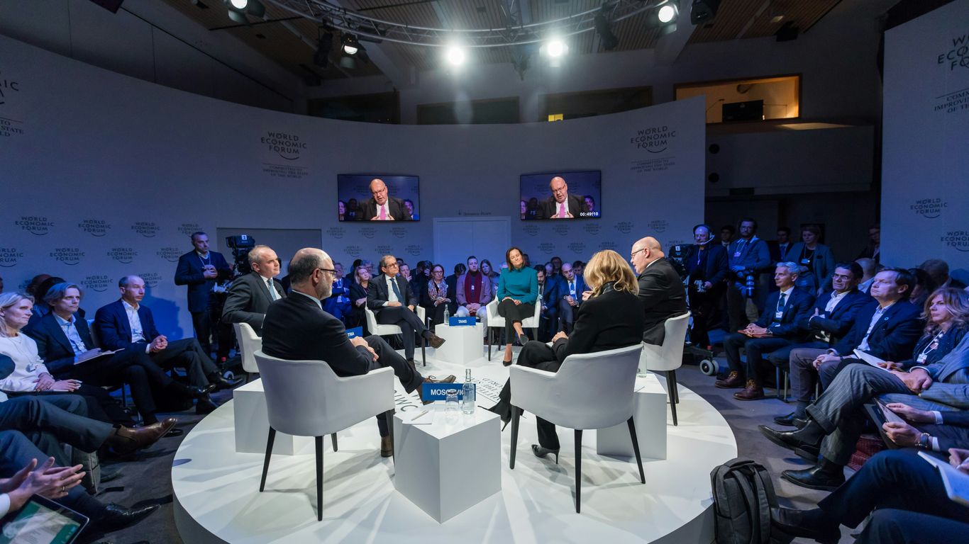 Executive discussion during a professional event