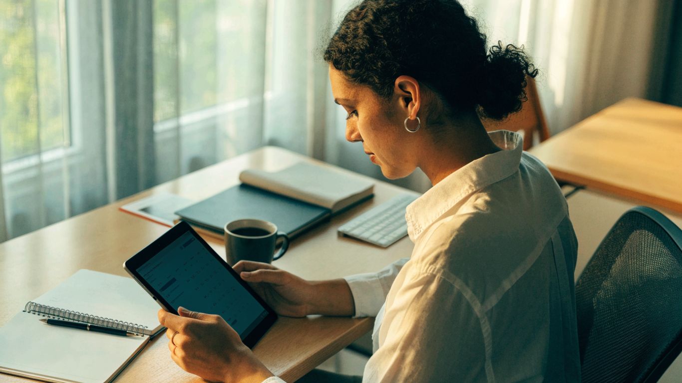 Business owner reviewing a calm customer follow-up plan