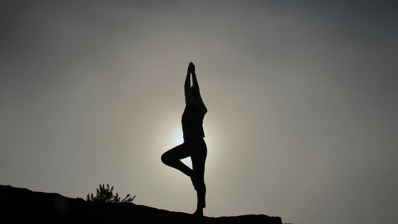 Yoga practitioner holding a strong standing pose