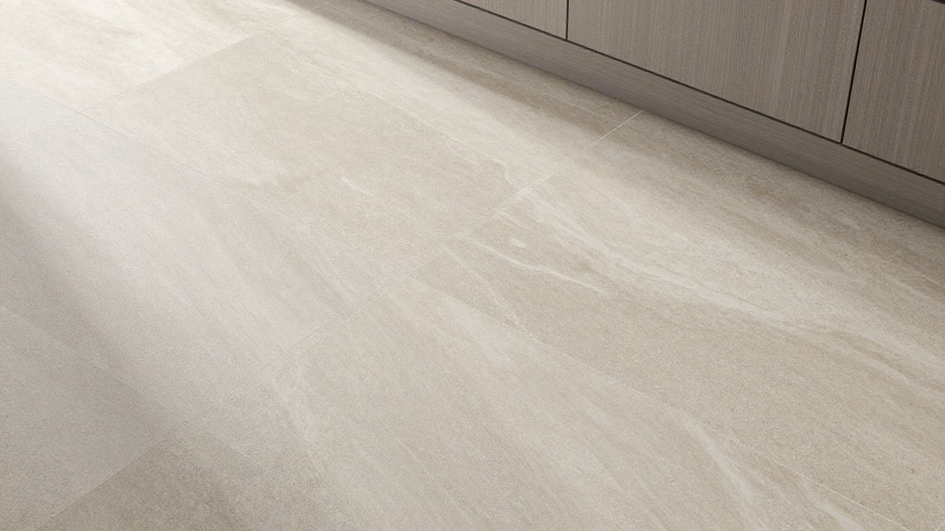 Natural stone tiles on a kitchen floor.