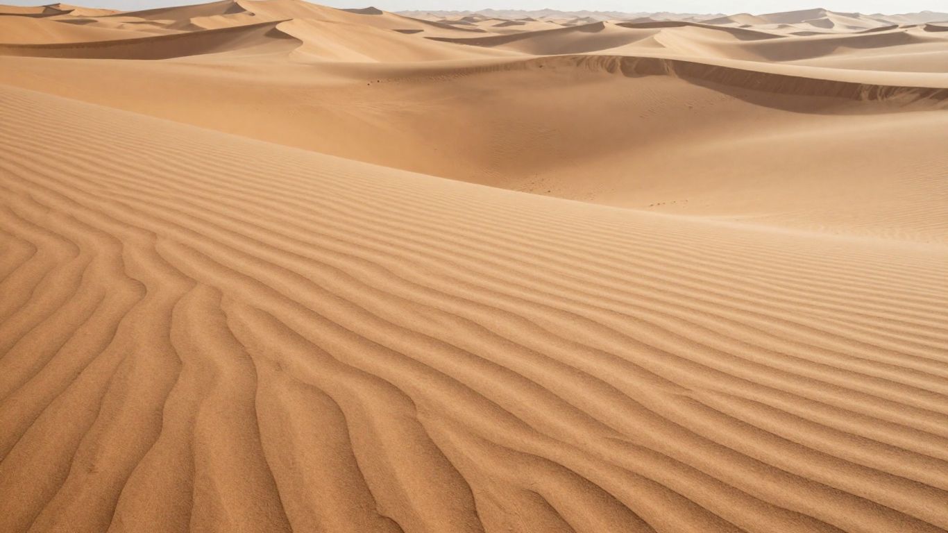 Shifting sands transforming into a smooth, polished surface.