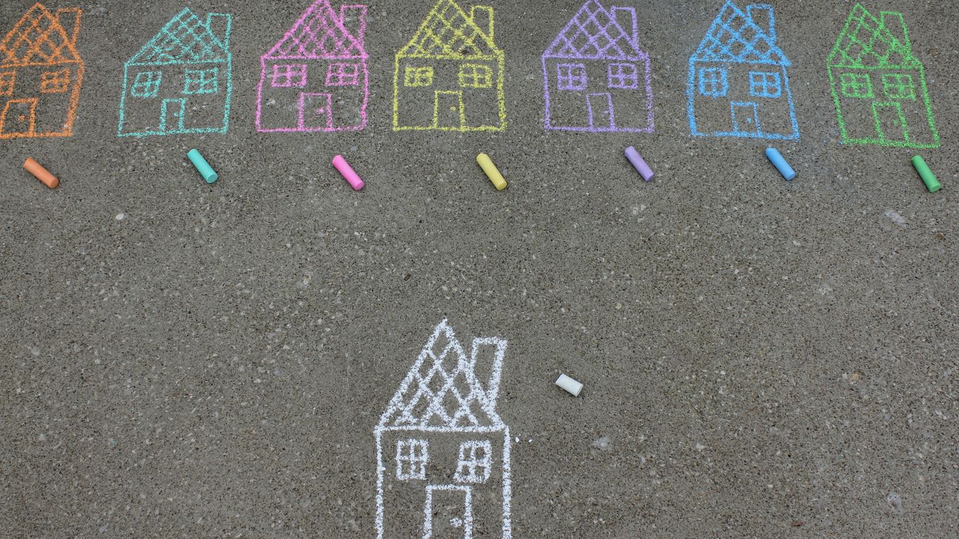 assorted-color house illustration on gray concrete surface