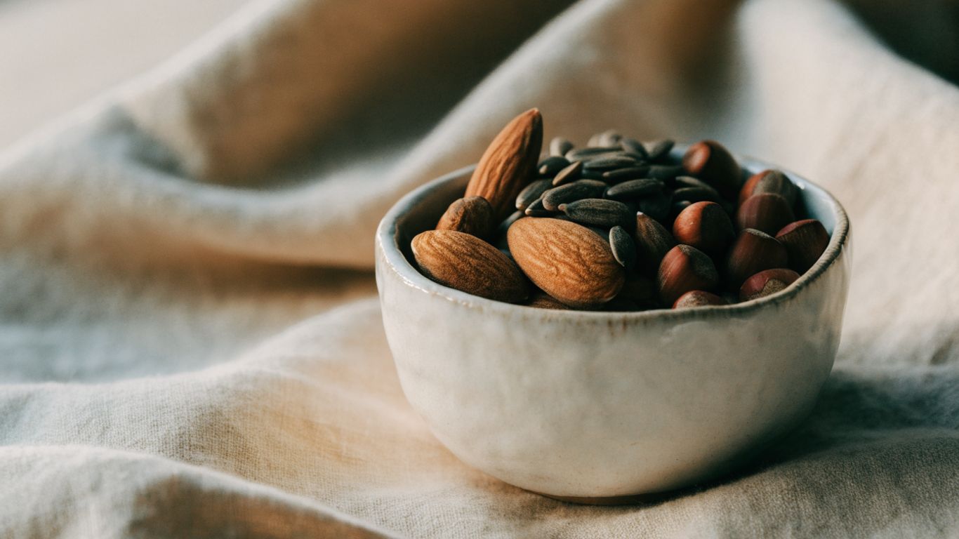 Nuts and seeds in a small ceramic bowl