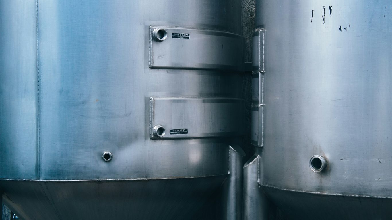 a close up of a large metal tank