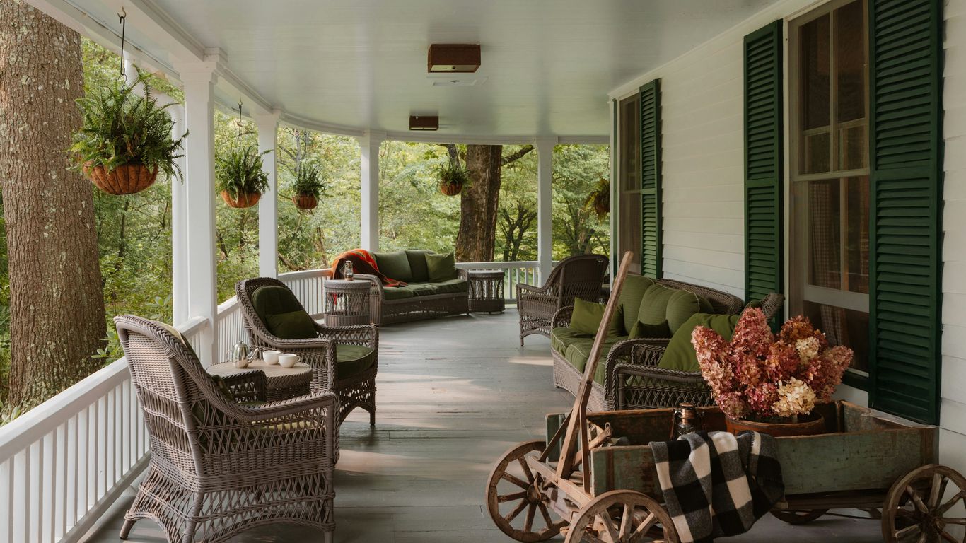 A cozy porch with comfortable seating.