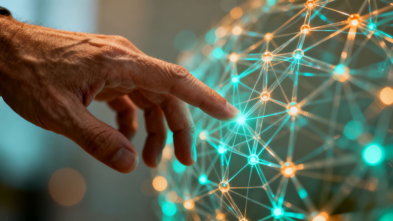 Human hand interacting with glowing digital network.