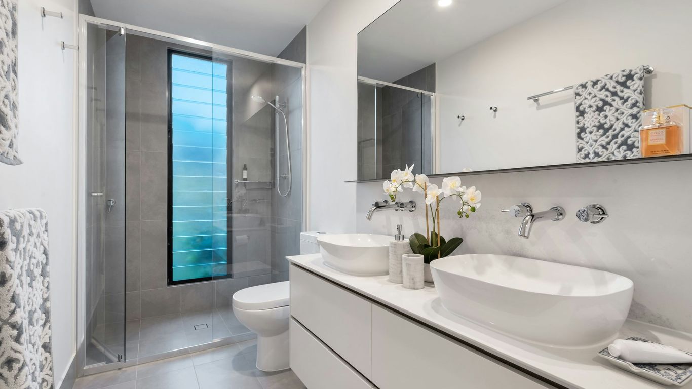 Durable bathroom features with clear acrylic panels